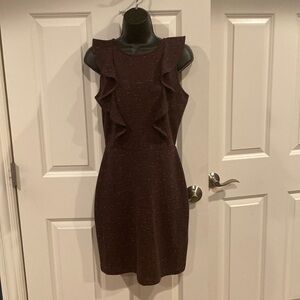 Small purple cupcakes and cashmere sleeveless dress with ruffles and back zip